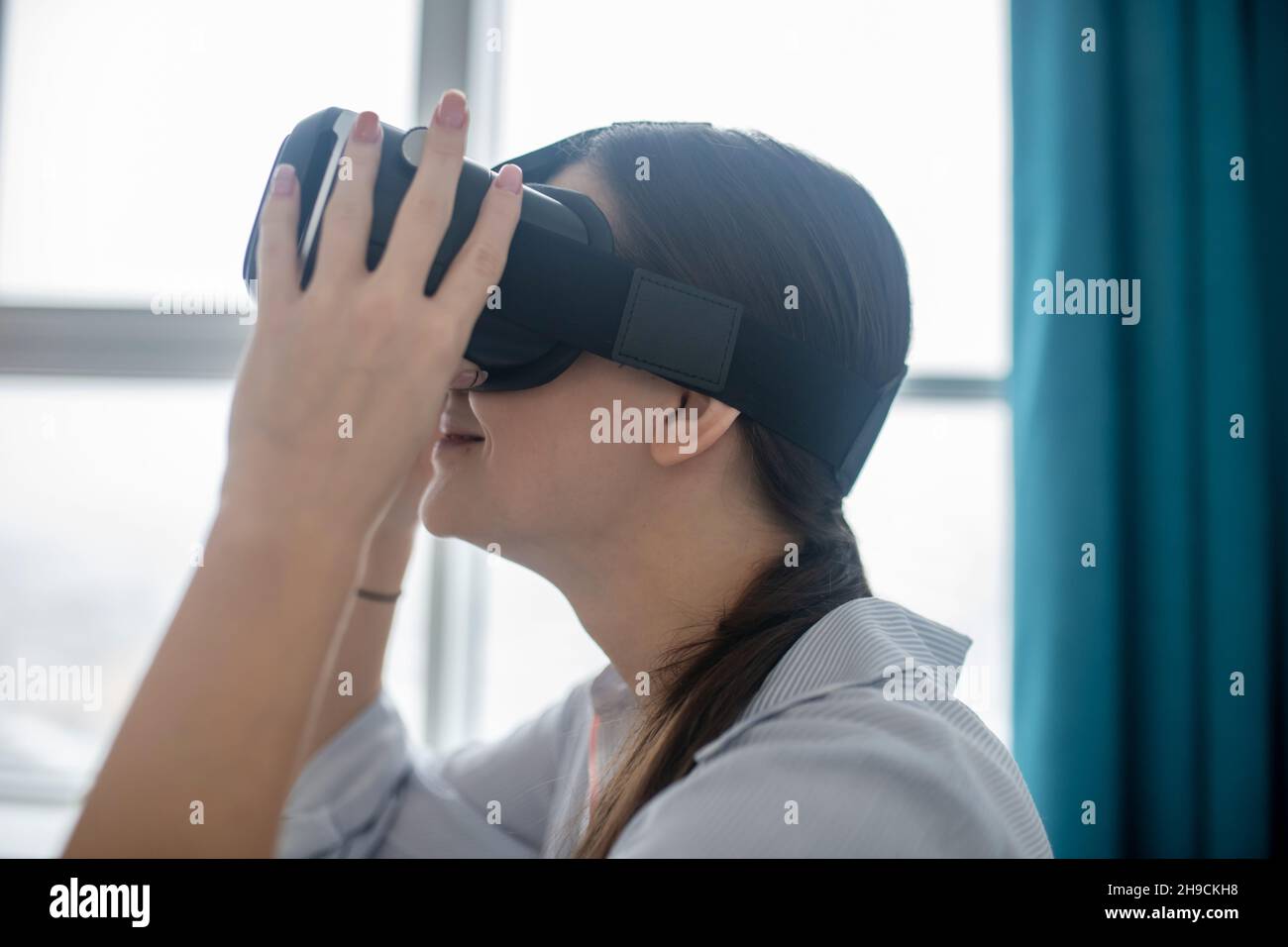 3D player enjoying an immersive gaming experience Stock Photo