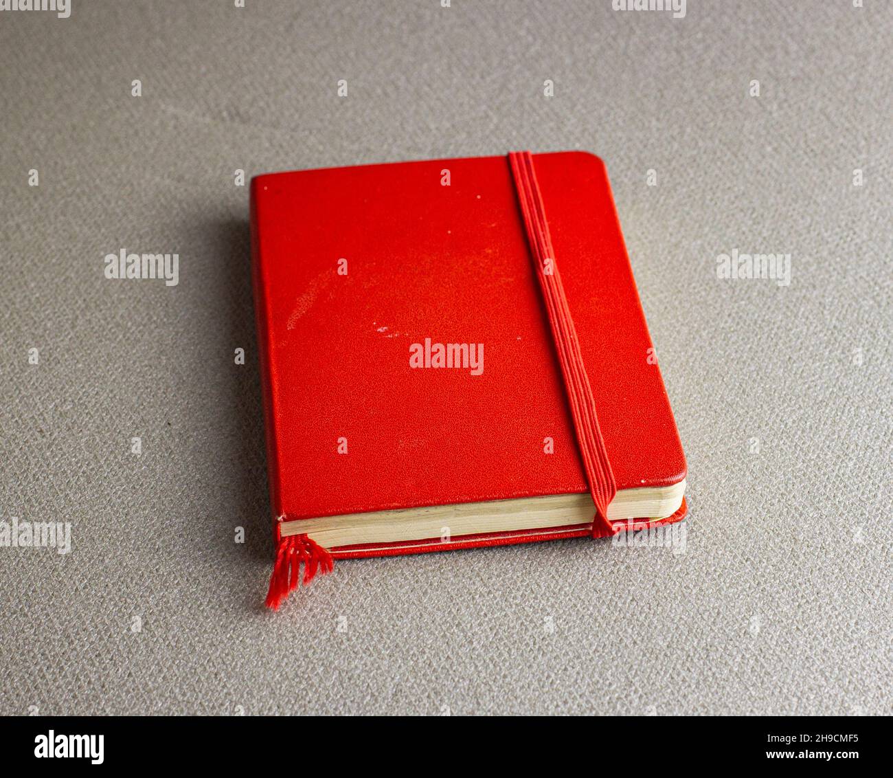 stack of ring binder book or red notebook isolated on white background