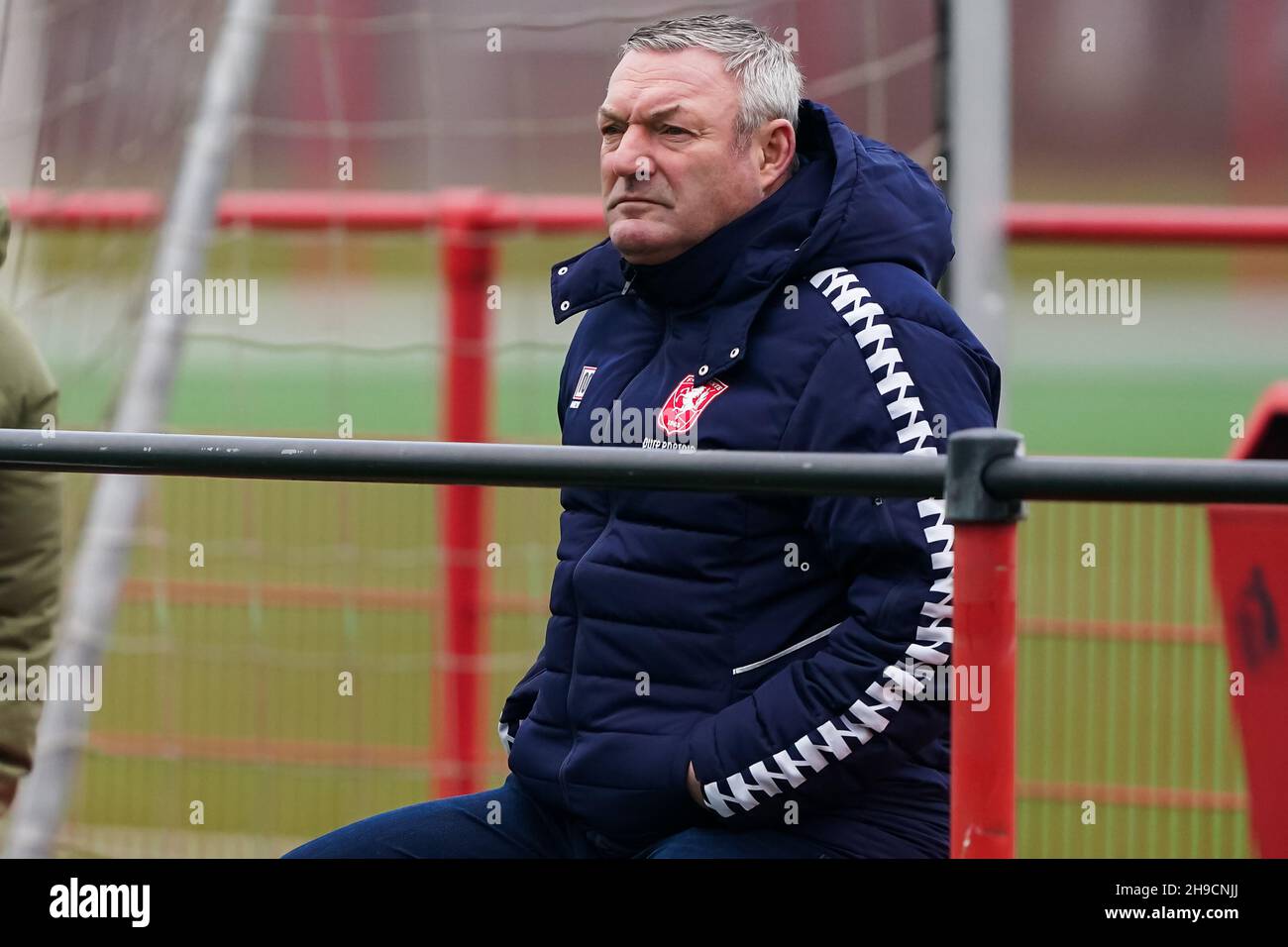 HENGELO, NETHERLANDS - DECEMBER 6: Ron Jans of FC Twente looks on from the sideline during the Reservecompetitie match between FC Twente and SC Heerenveen at the FC Twente-trainingscentrum on December 6, 2021 in Hengelo, Netherlands (Photo by Andre Weening/Orange Pictures) Stock Photo