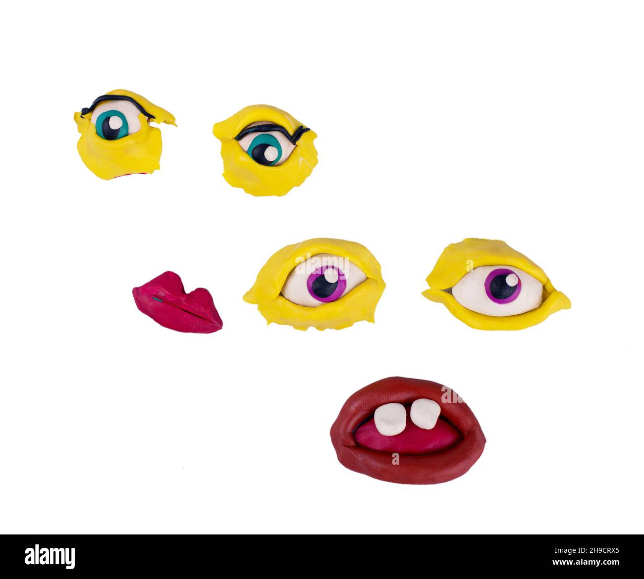 Weird Crazy plasticine eyes and lips isolated on white background. Good for modern photo collage Stock Photo