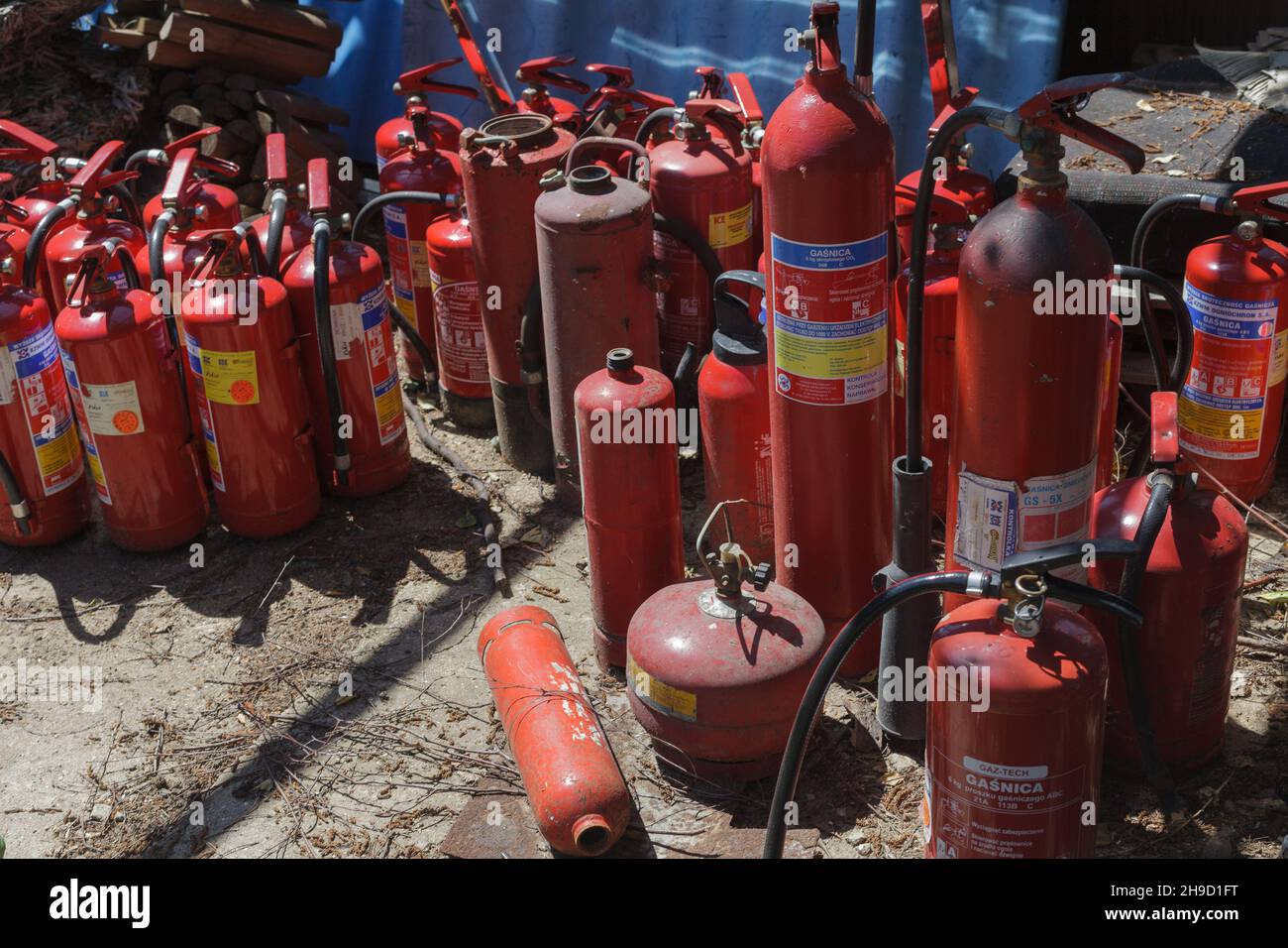 Poznan, Poland June 21.2021 Old and unused fire extinguishers. dump