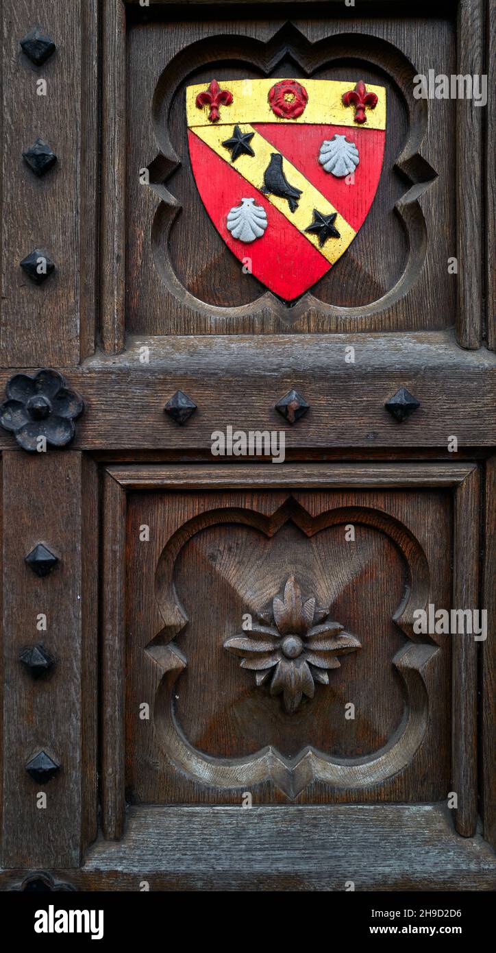 Coat of arms, Exeter college, university of Oxford, England, on one of its solid wooden doors. Stock Photo