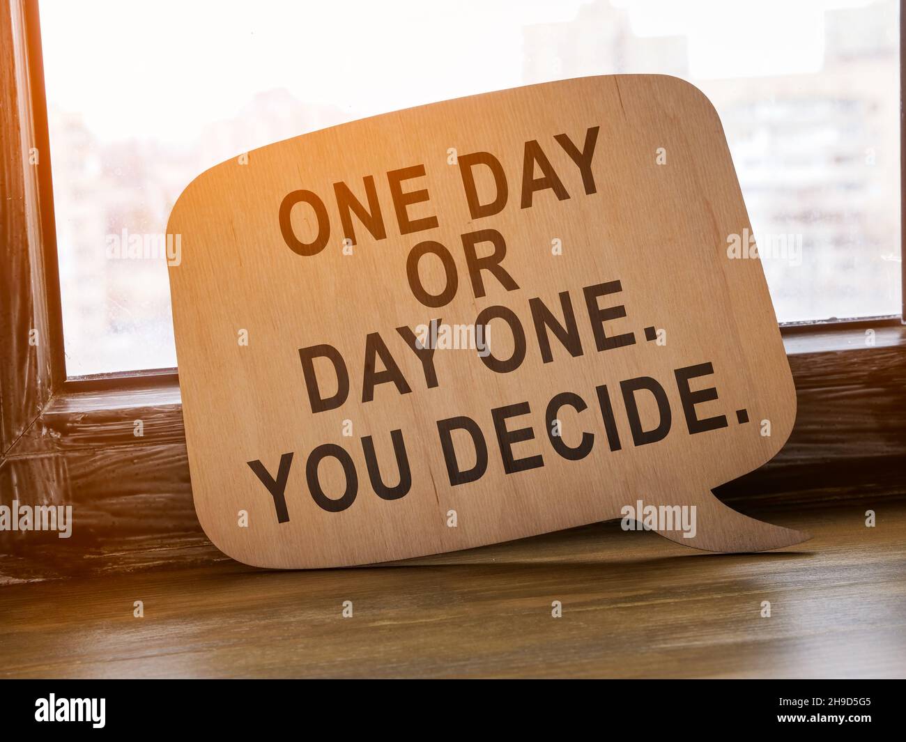 One day or day one you decide. Motivational phrase. Stock Photo