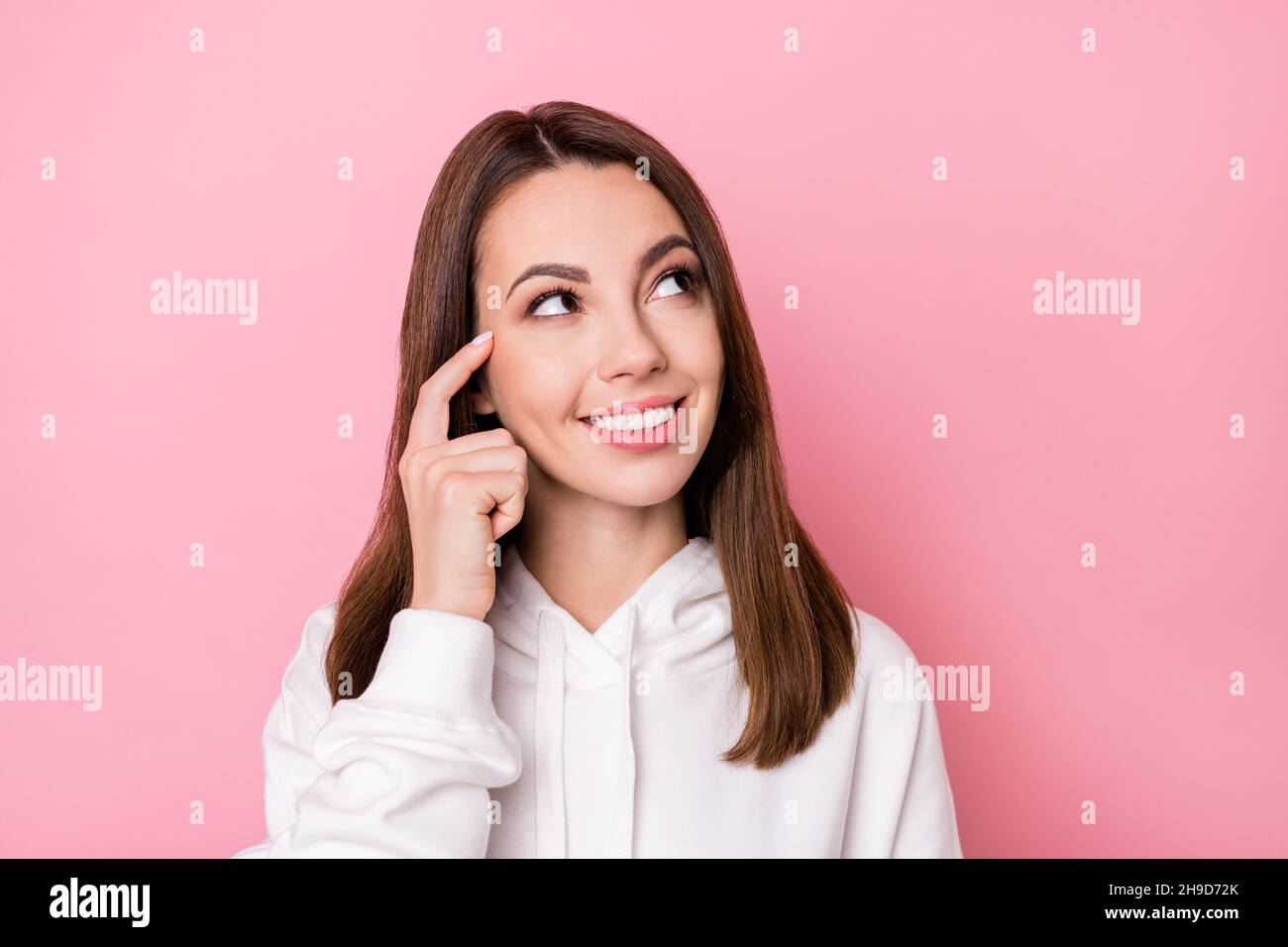 Photo of young cheerful girl happy positive smile finger touch head ...