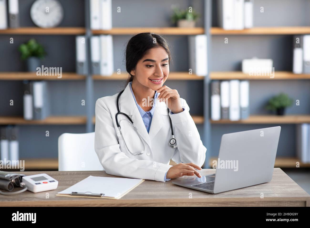 Young indian woman doctor works hi-res stock photography and images - Alamy