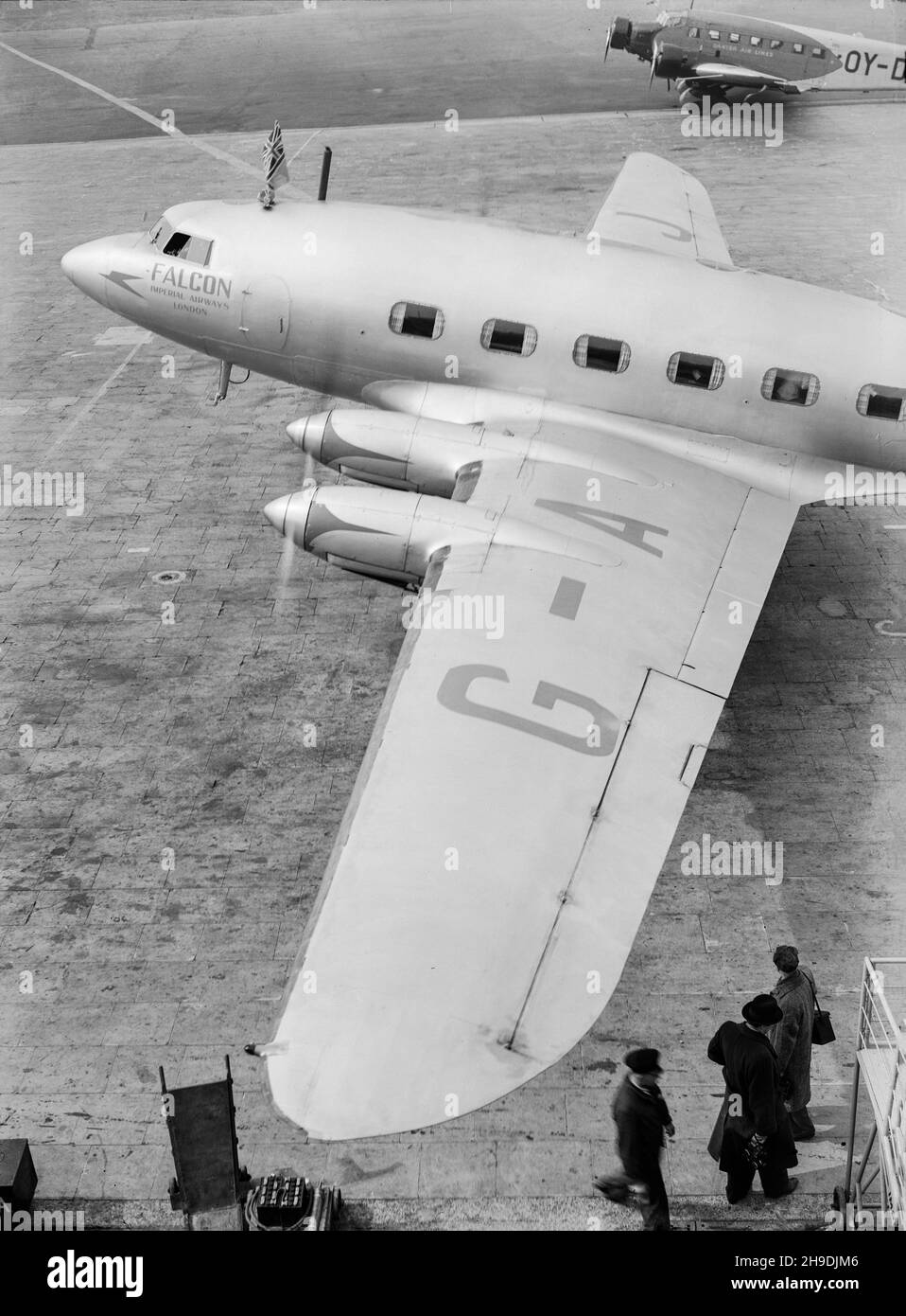 Vintage black and white photograph taken in 1938 showing a A De Havilland DH.91 Albatross, serial number G-AFDJ, named Falcon, of Imperial Airways at Croydon Aerodrome, outside London. Stock Photo