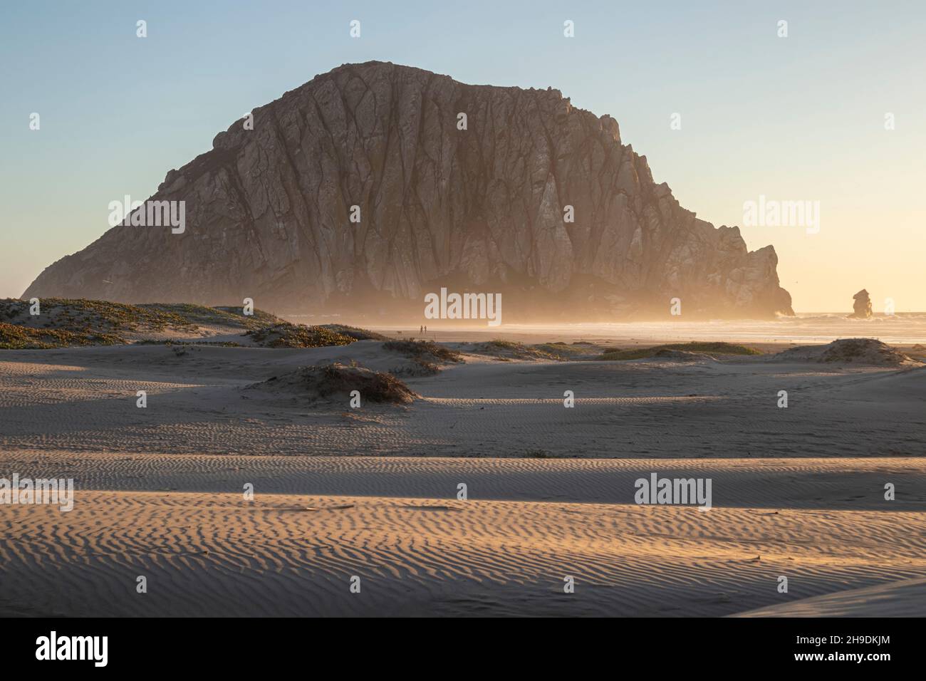 Morro Rock from Morro Strand State Beach, Morro Bay, California, USA Stock Photo