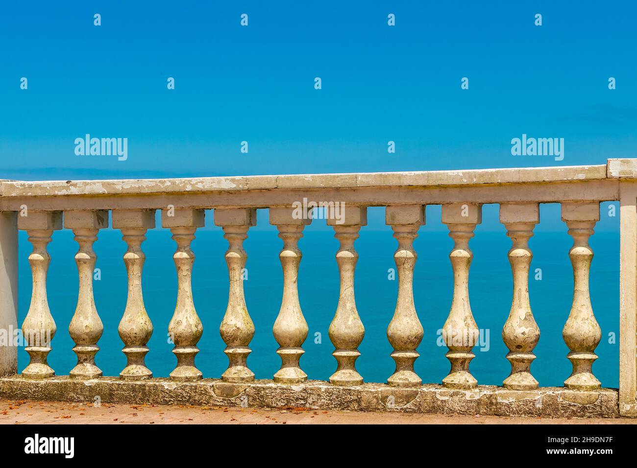 Old balustrada against the background of the sea in beautiful sunny ...