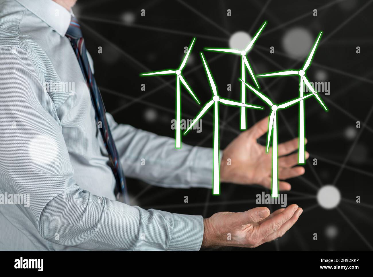 Clean energy concept above the hands of a man Stock Photo - Alamy