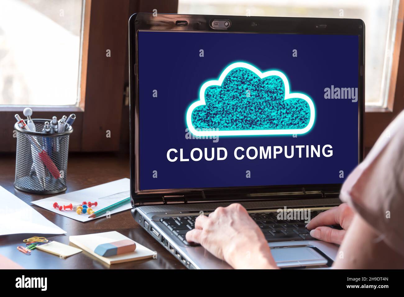 Laptop screen displaying a cloud computing concept Stock Photo - Alamy