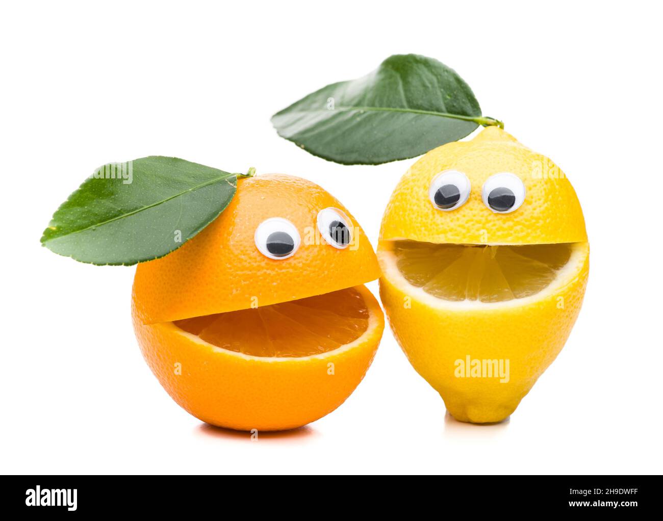 lemon, orange, face, couple, sing, head, fruit, laugh, mouth, friendly, eyes wide, similar, equal, fresh, twins, background, isolated, smile, lively, Stock Photo