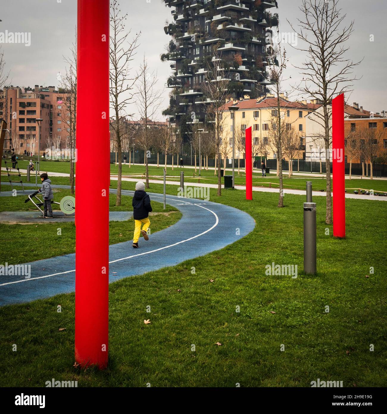 Milan, Lombardy, Italy.  December 2019 , A boy running in a park in the city of Milan. Stock Photo