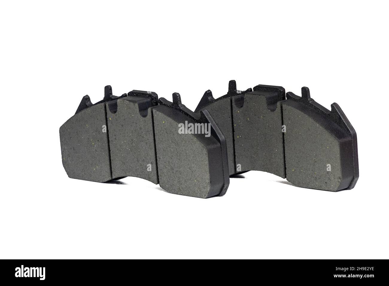 A pair of new brake pads on isolated white background Stock Photo