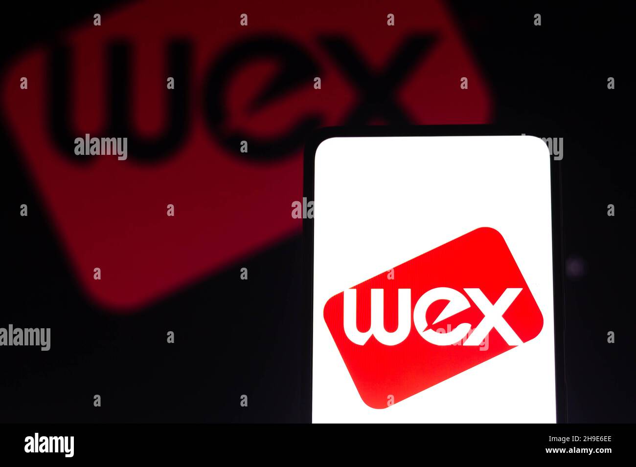 In this photo illustration the WEX Inc. logo seen displayed on a ...