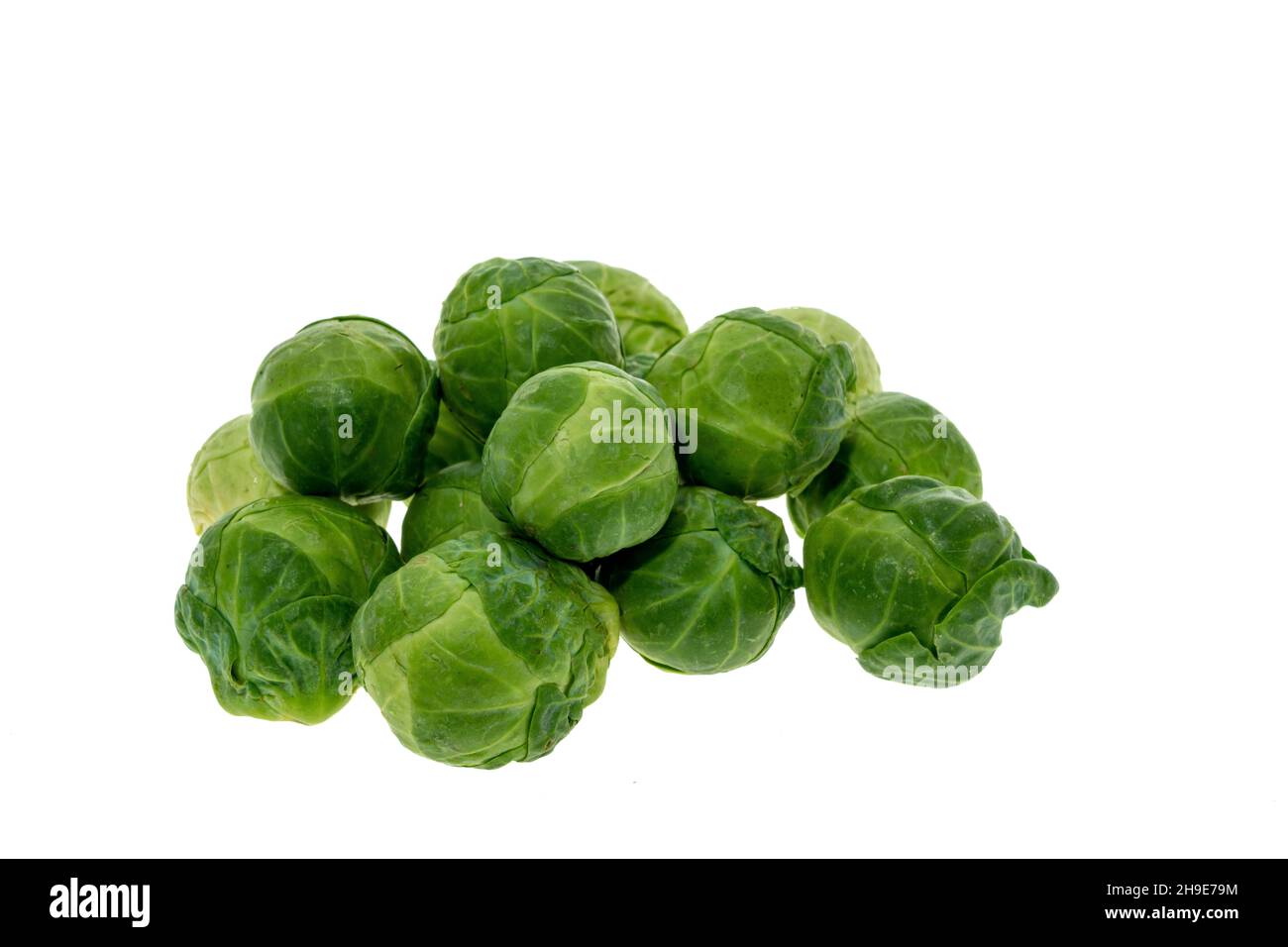 Fresh raw Brussels sproats - white background Stock Photo