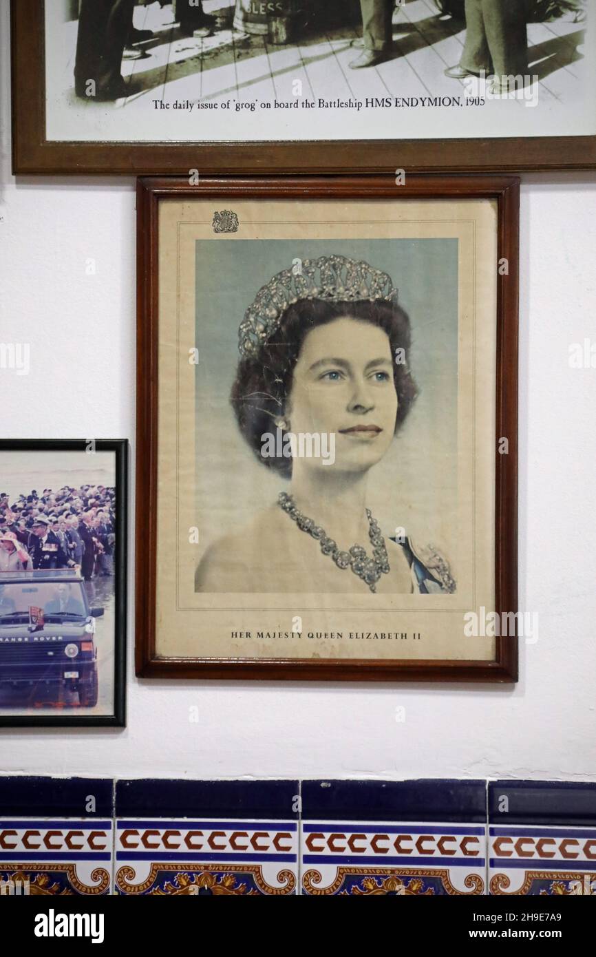 Portrait of Her Majesty Queen Elizabeth ll displayed at a public house in Gibraltar Stock Photo