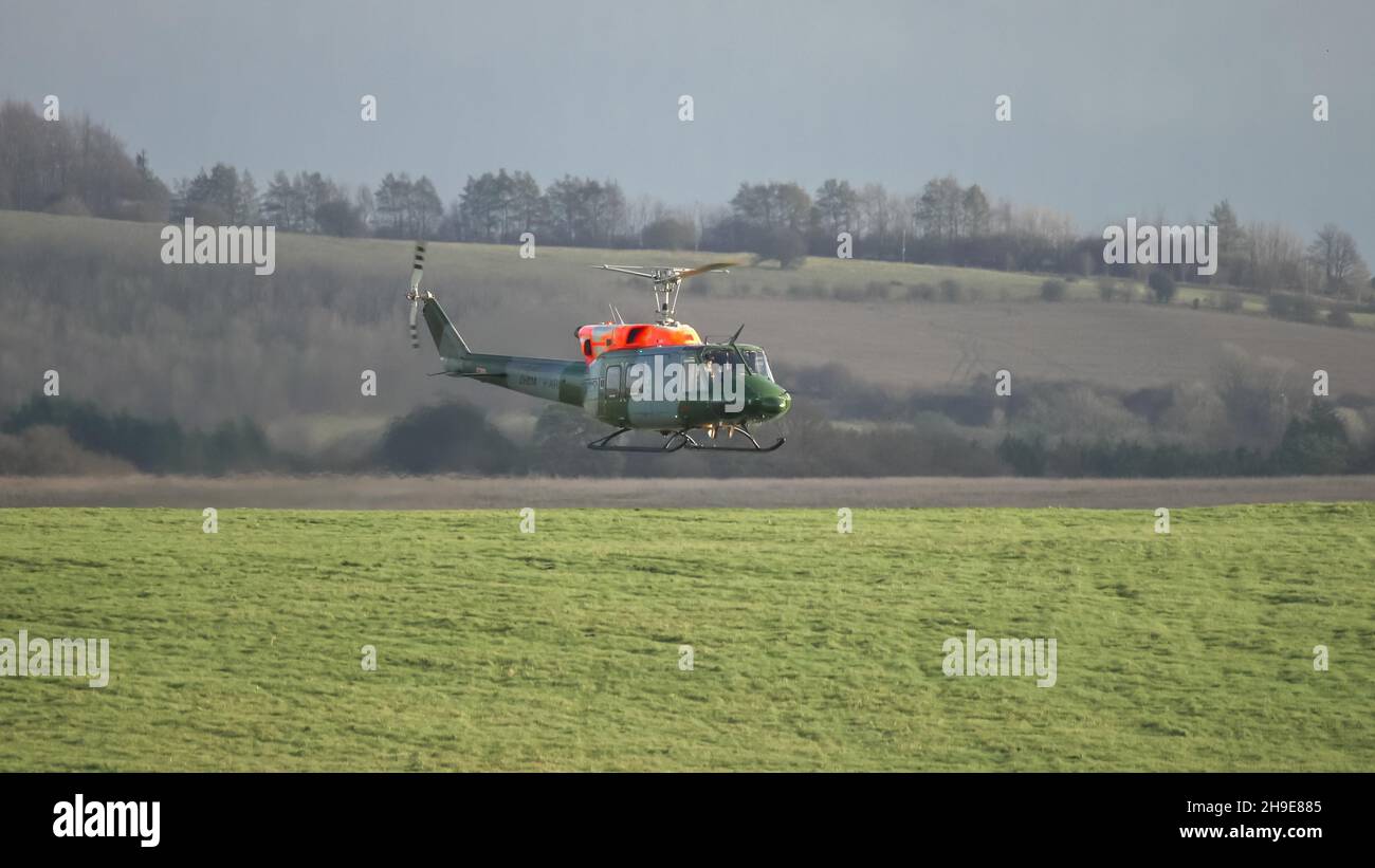 ZH814 British army (Army Air Corps AAC) 1971 helicopter Bell 212 B-BGMH conducting pilot training Salisbury Plain UK Stock Photo