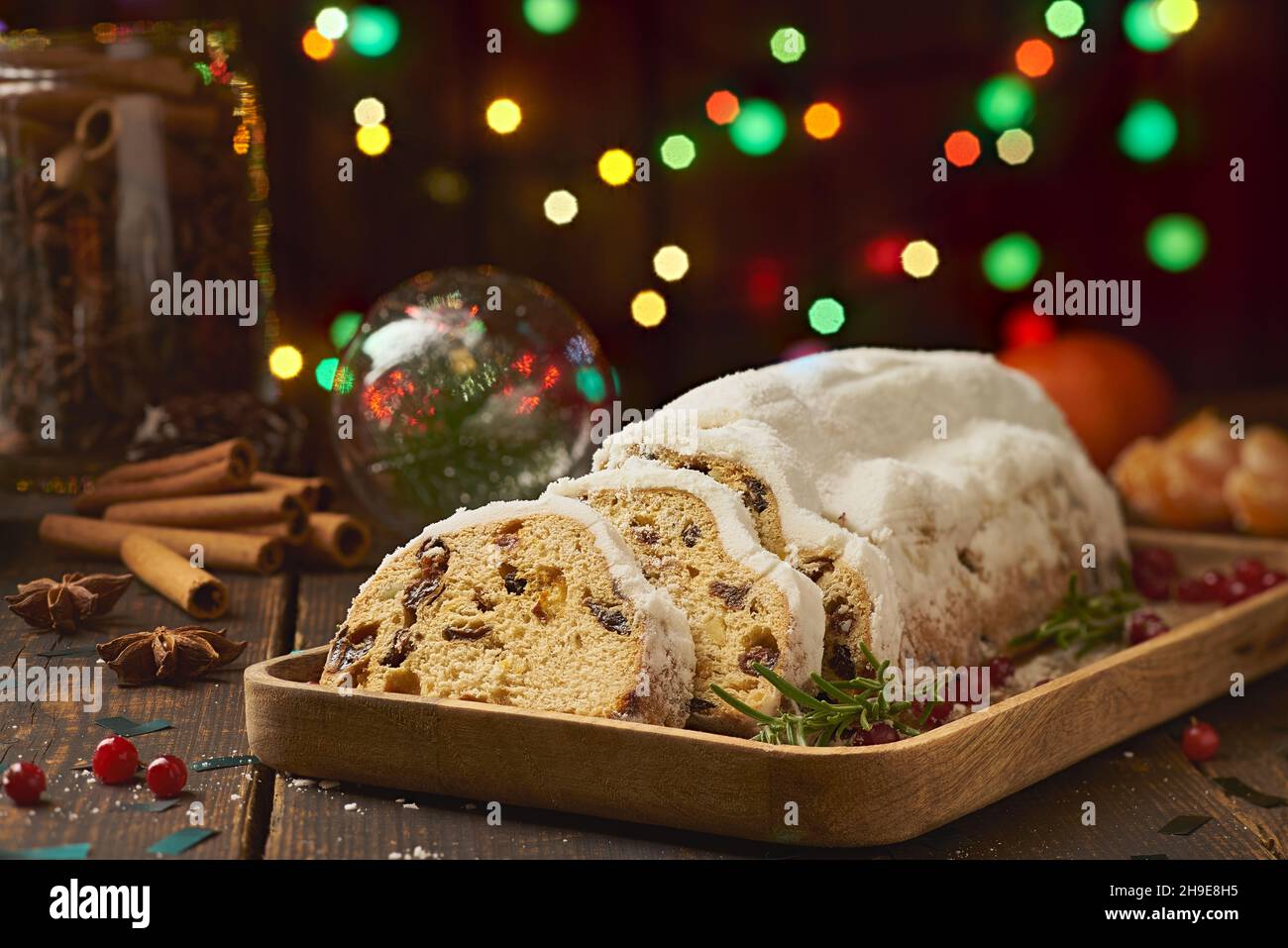 Traditional Christmas cake with spices and xmas decorations Stock Photo