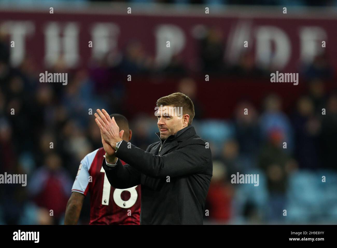 Birmingham, UK. 05th Dec, 2021. Steven Gerrard, the manager of Aston Villa FC applauds the Villa fans after the game. Premier League match, Aston Villa v Leicester City at Villa Park in Birmingham on Sunday 5th December 2021. this image may only be used for Editorial purposes. Editorial use only, license required for commercial use. No use in betting, games or a single club/league/player publications. pic by Andrew Orchard/Andrew Orchard sports photography/Alamy Live news Credit: Andrew Orchard sports photography/Alamy Live News Stock Photo