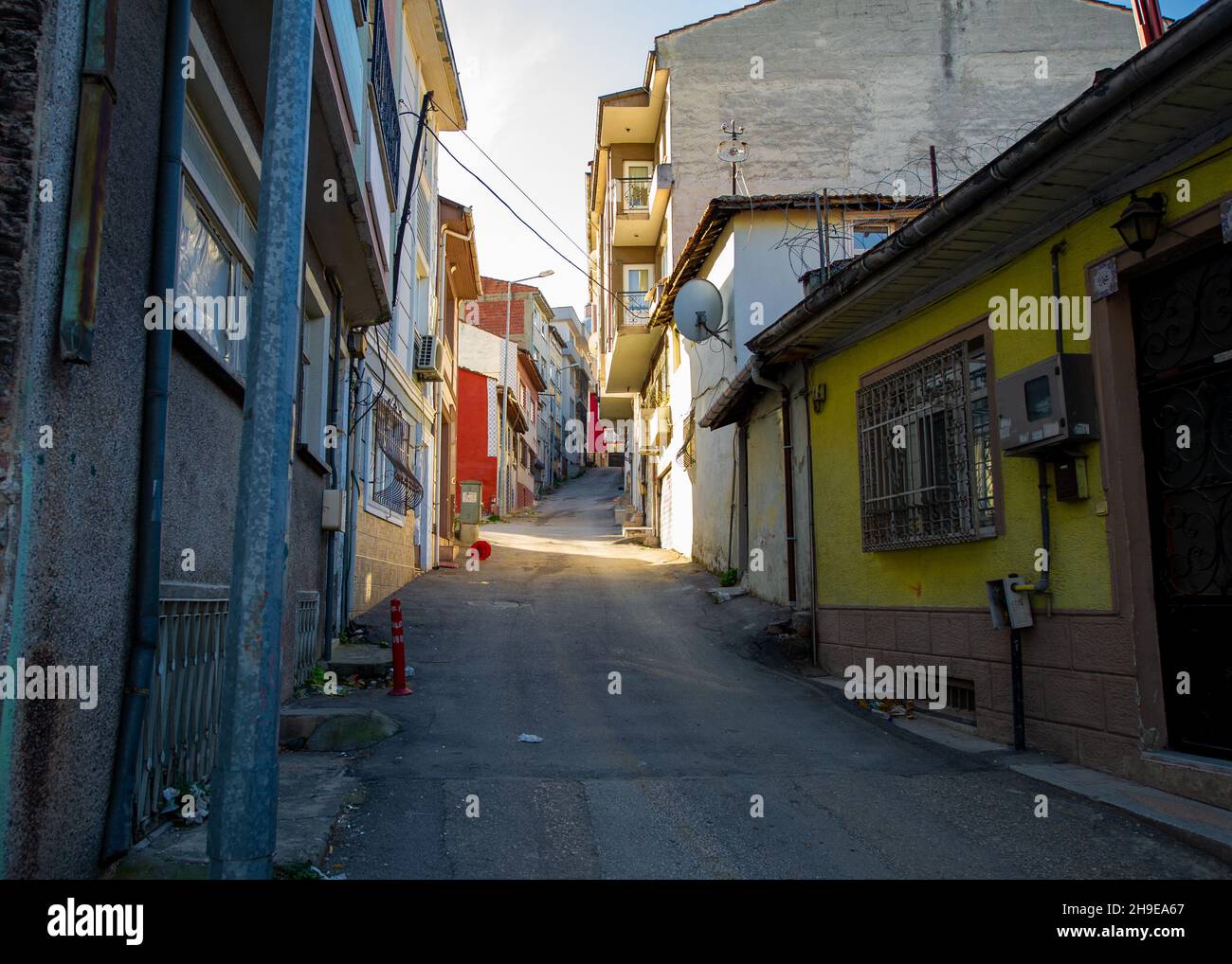 Street in Bursa town in a hilltop neighborhood with colorful houses Stock Photo
