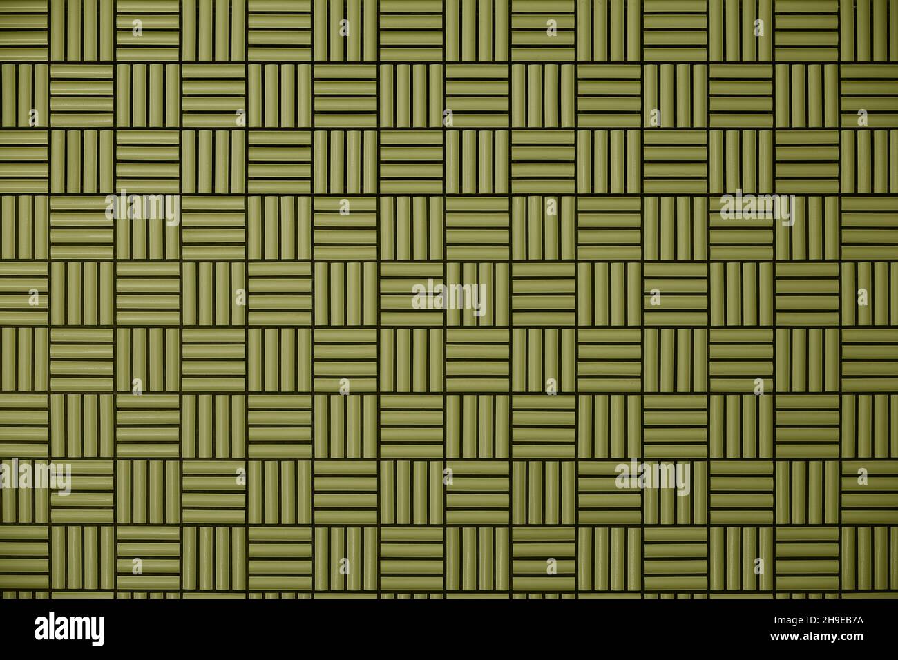 Yellow tile wall with geometric pattern as background material Stock Photo