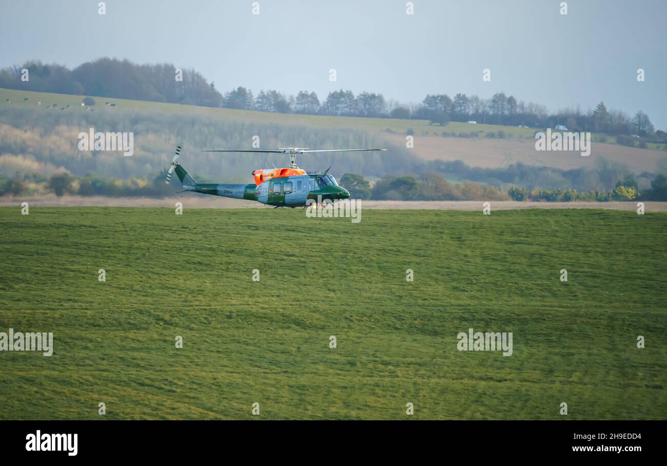 ZH814 British army (Army Air Corps AAC) 1971 helicopter Bell 212 B-BGMH conducting pilot training Salisbury Plain UK Stock Photo