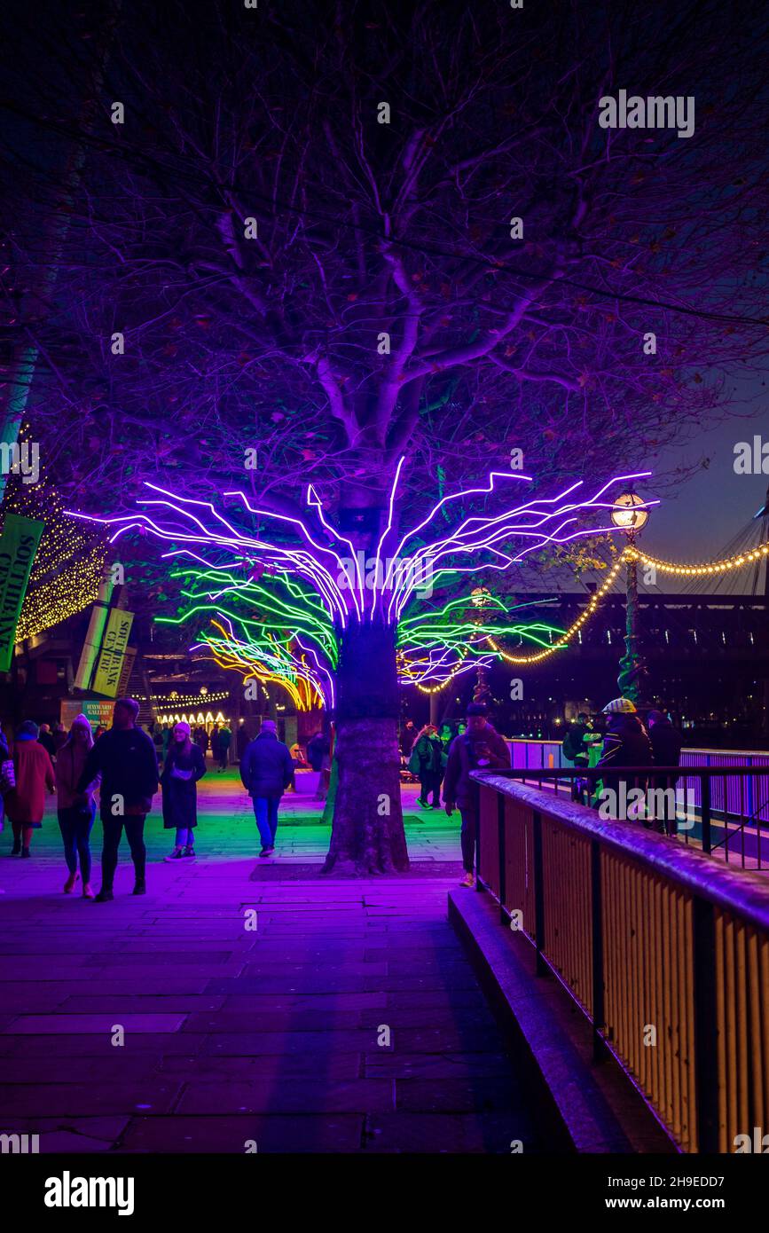 Christmas decoration on the Southbank riverside lit at night, London