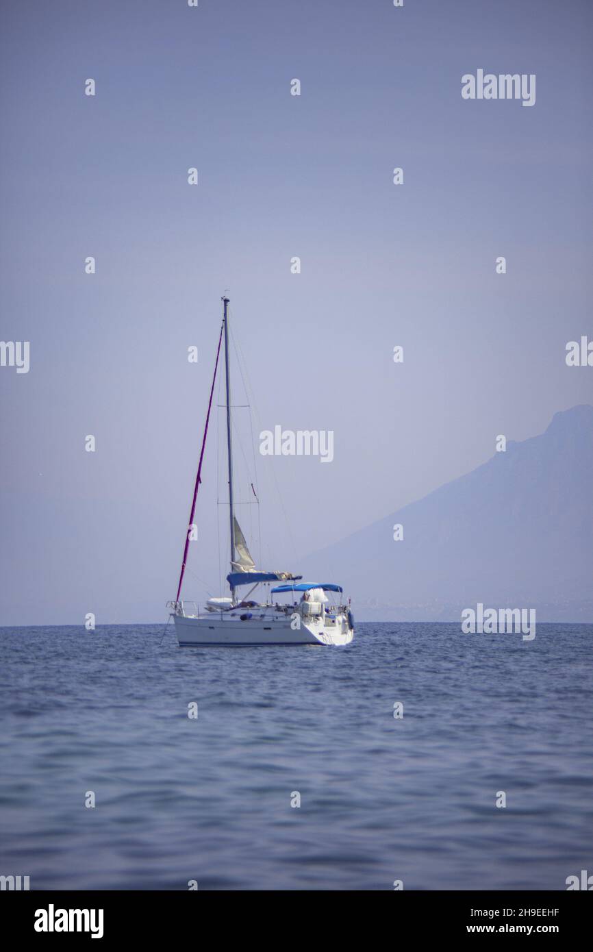 Sailboat navigate in sicily Stock Photo Alamy