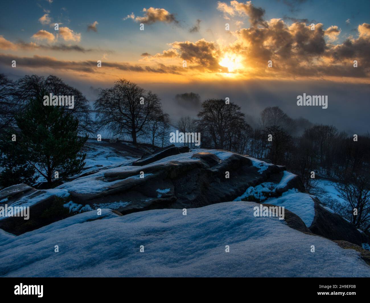 Magical winter wonderland at Black Rocks after morning snow Derbyshire Dales UK Weather Stock Photo