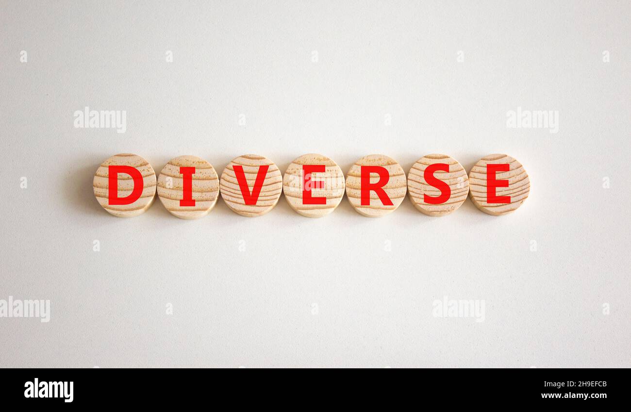 Diverse and diversity symbol. The concept word Diverse on wooden ...