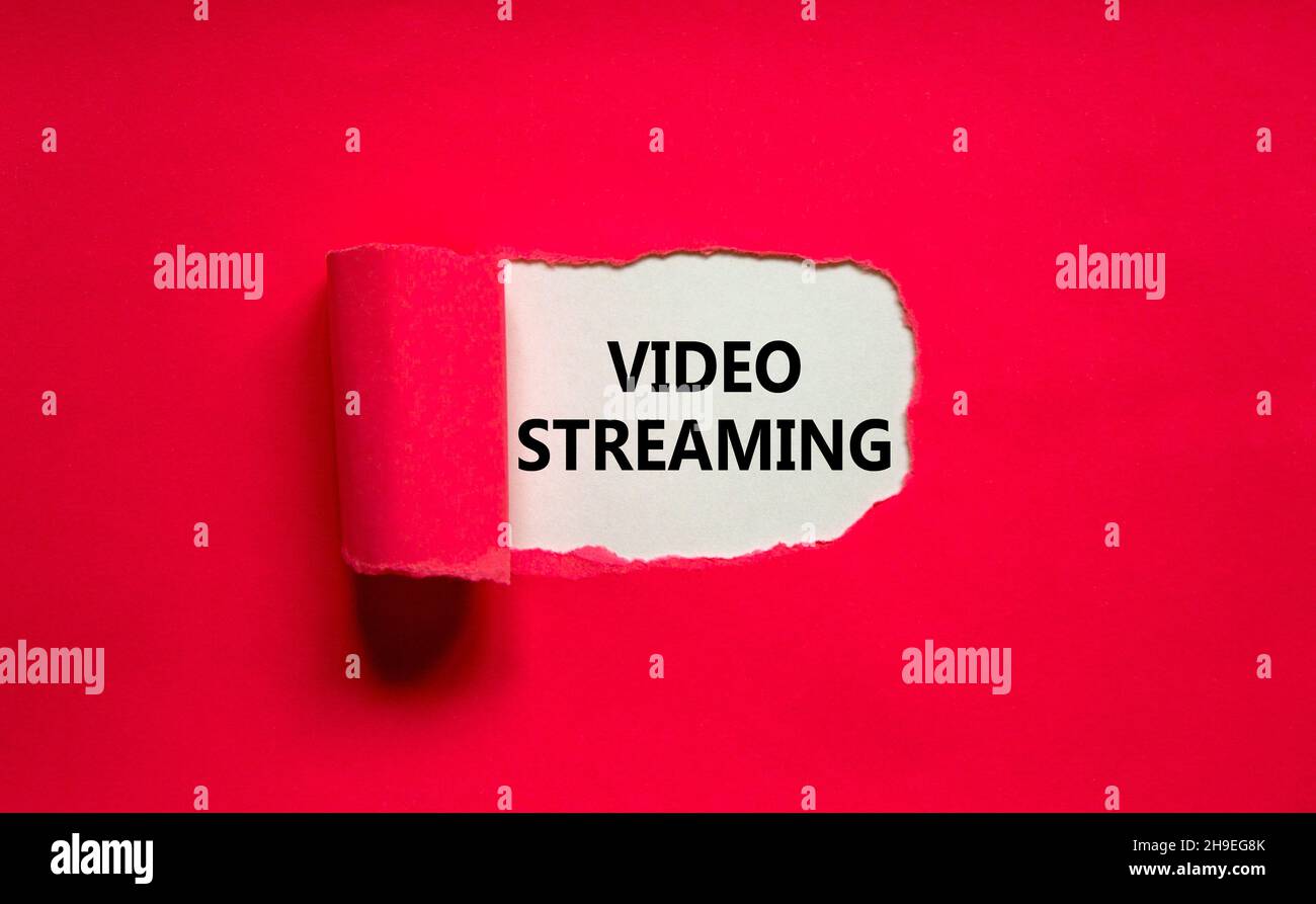 Video streaming symbol. Concept words Video streaming appearing behind ...