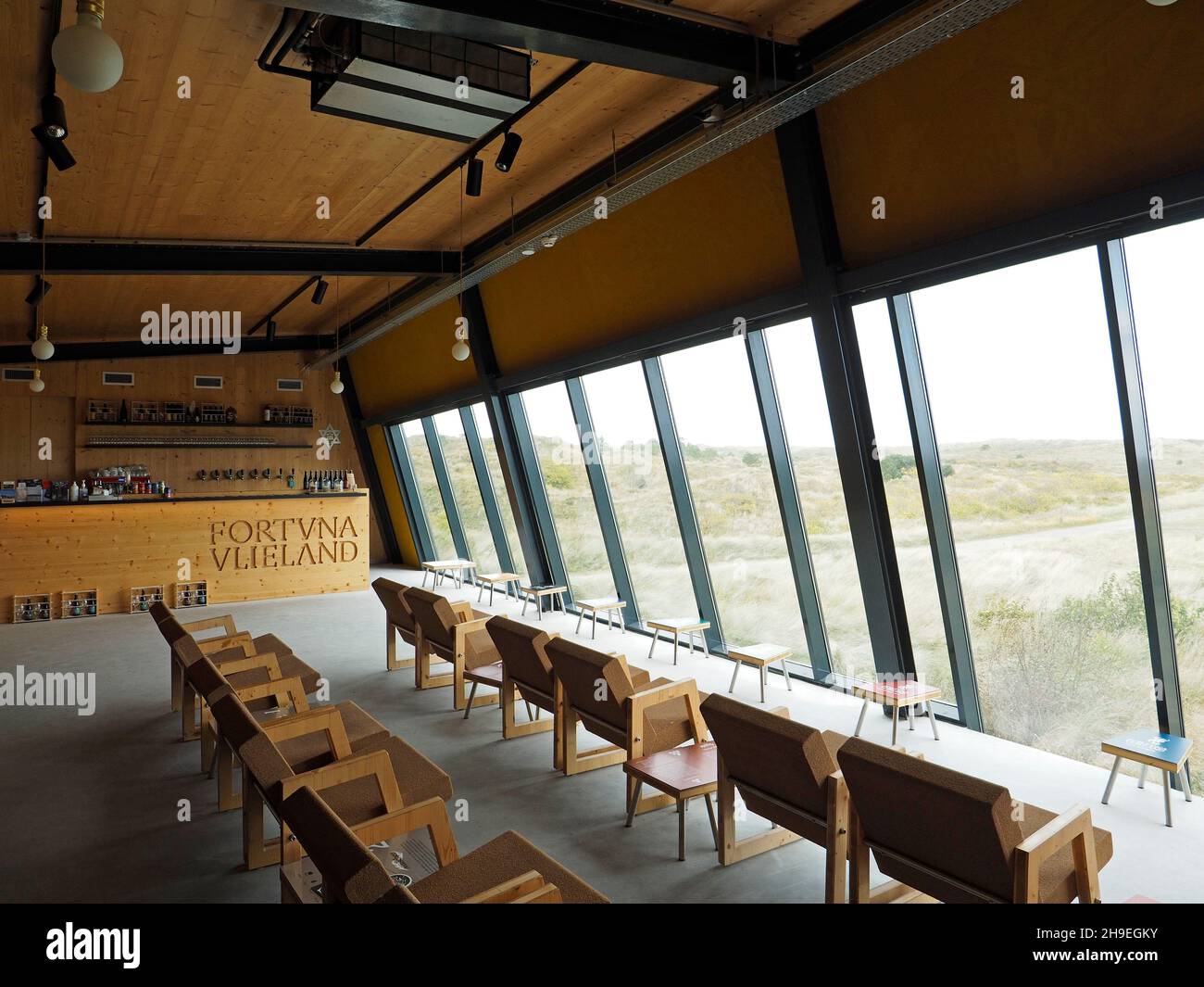Visitors space with bar at brewery Fortuna on Vlieland Island, the Netherlands. They use water from the island itself and are fully sustainable. Stock Photo