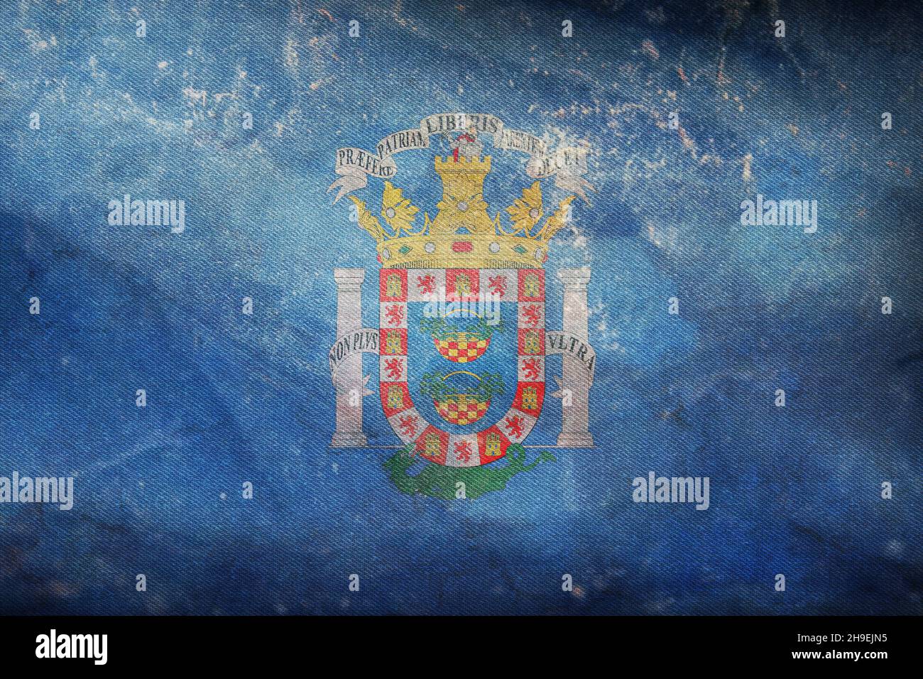 Top view of retro flag Melilla, Spain with grunge texture. Spanish travel and patriot concept. no flagpole. Plane design layout. Flag background Stock Photo
