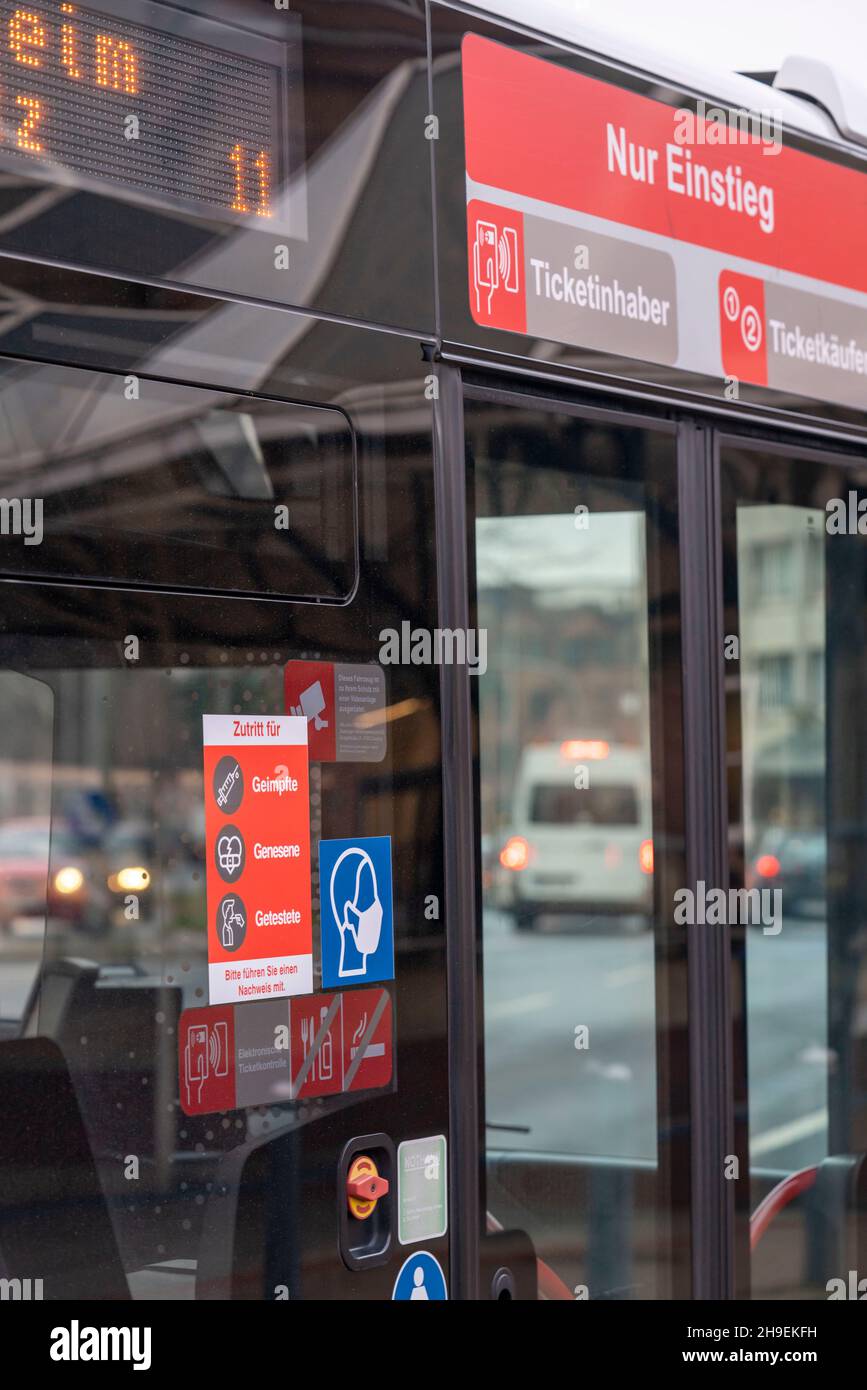 Local bus, public transport, during the fourth Corona wave, 3G regulation, signs, in Duisburg, NRW, Germany, Stock Photo