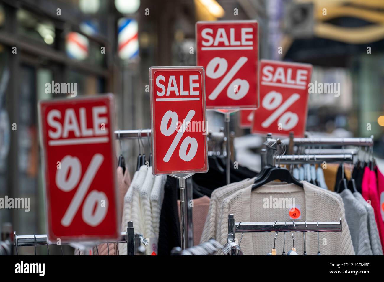 Sale, special offers of a clothing shop in the pedestrian precinct, in