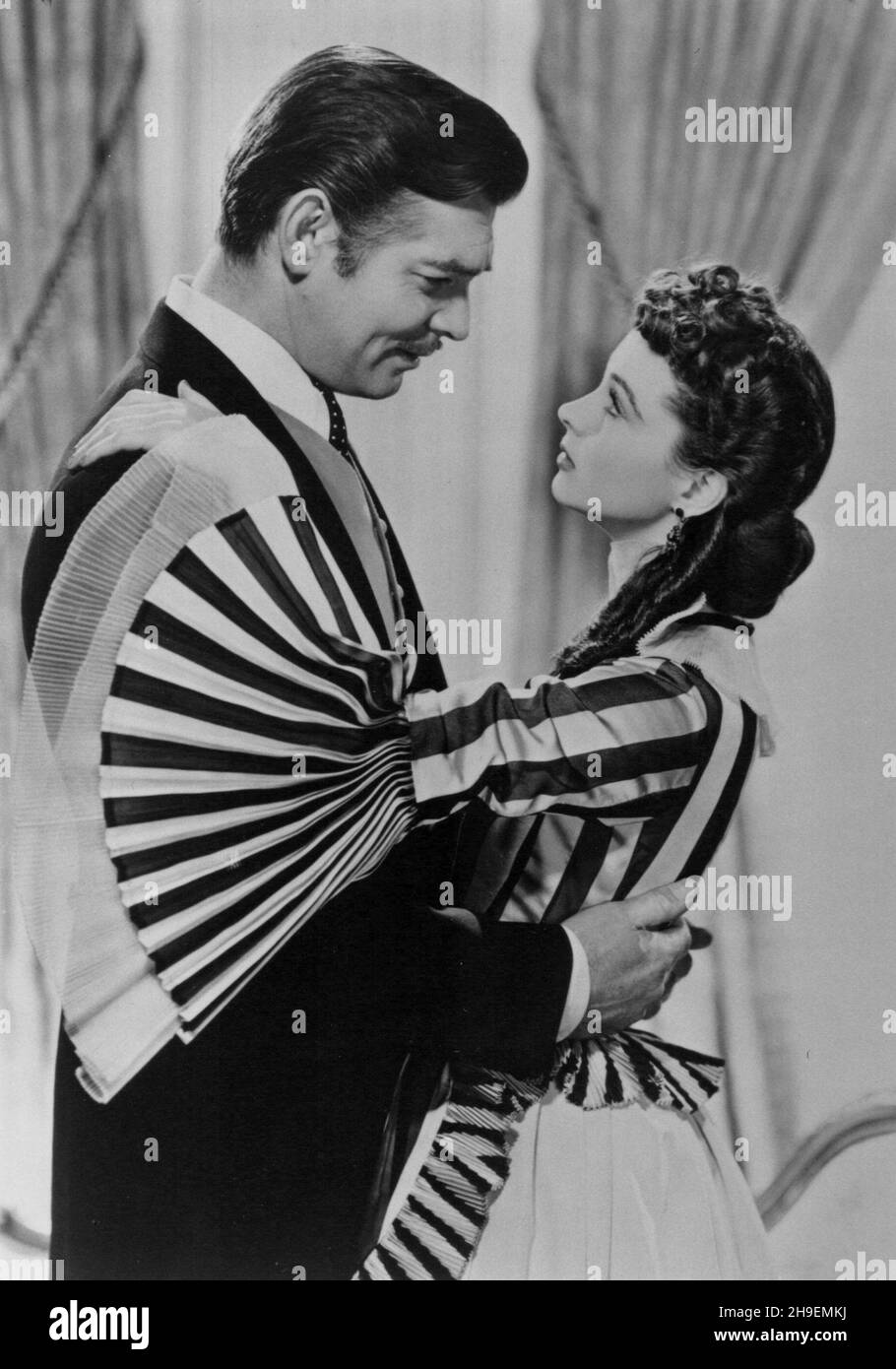 RELEASE DATE: 15 December 1939 TITLE: Gone with the Wind STUDIO: Metro-Goldwyn-Mayer DIRECTOR: Victor Fleming PLOT: The manipulative daughter of a Georgia plantation owner conducts a turbulent romance with a roguish profiteer during the American Civil War and Reconstruction periods. STARRING: CLARK GABLE as Rhett Butler and VIVIEN LEIGH as Scarlett. (Credit Image: ©Metro-Goldwyn-Mayer/Entertainment Pictures) Stock Photo