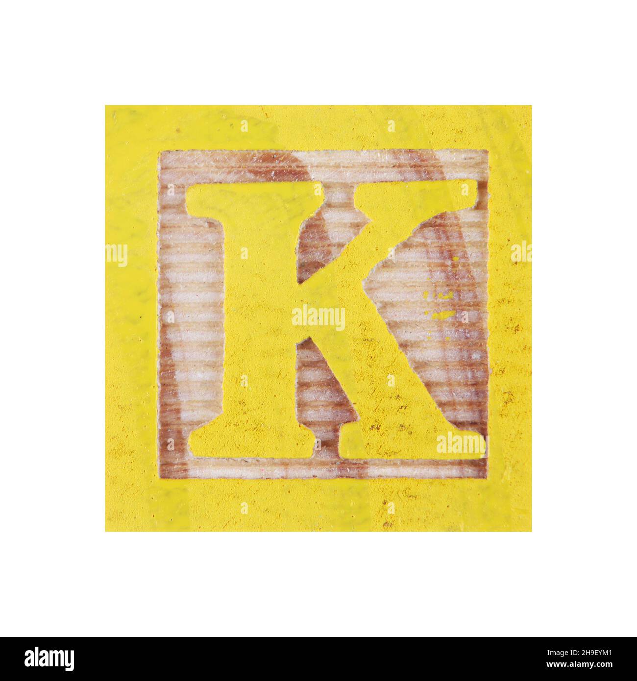 Letter K childs wood block on white with clipping path Stock Photo