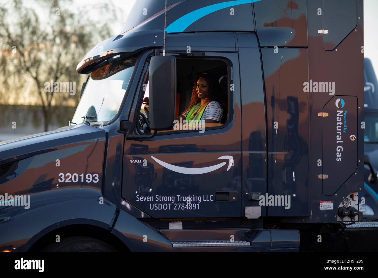 Driver manager Bree Davis pulls a truck into the yard of Amazon Freight  Partner Seven Strong