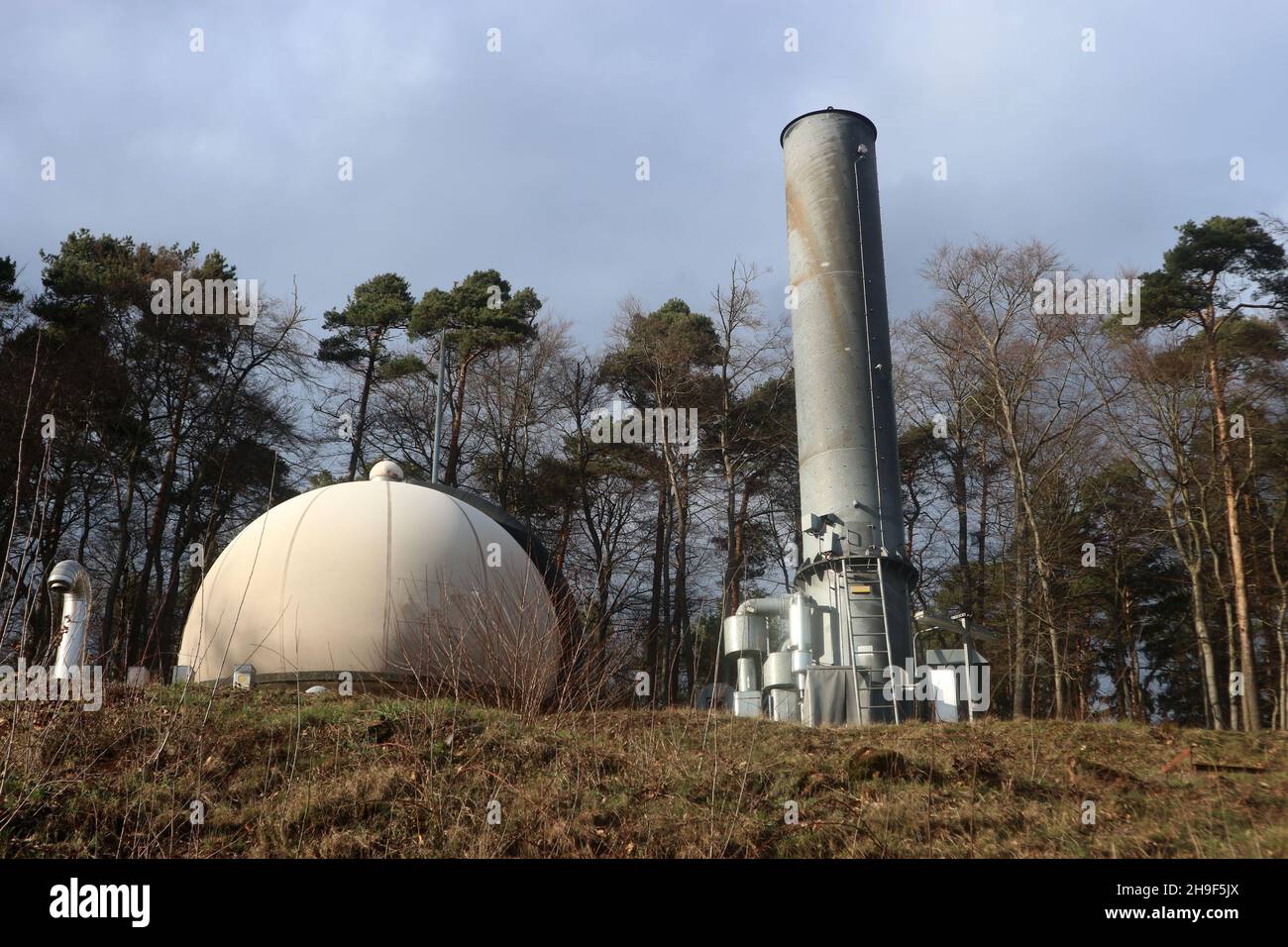 Gas flare and storage dome in a sanitary landfill for municipal solid