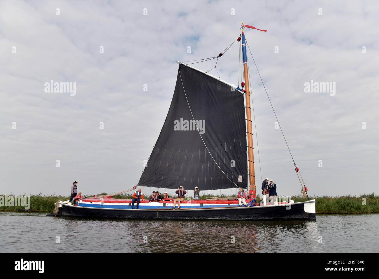 wherry albion sailing along river thurne at ludham norfolk england Stock Photo
