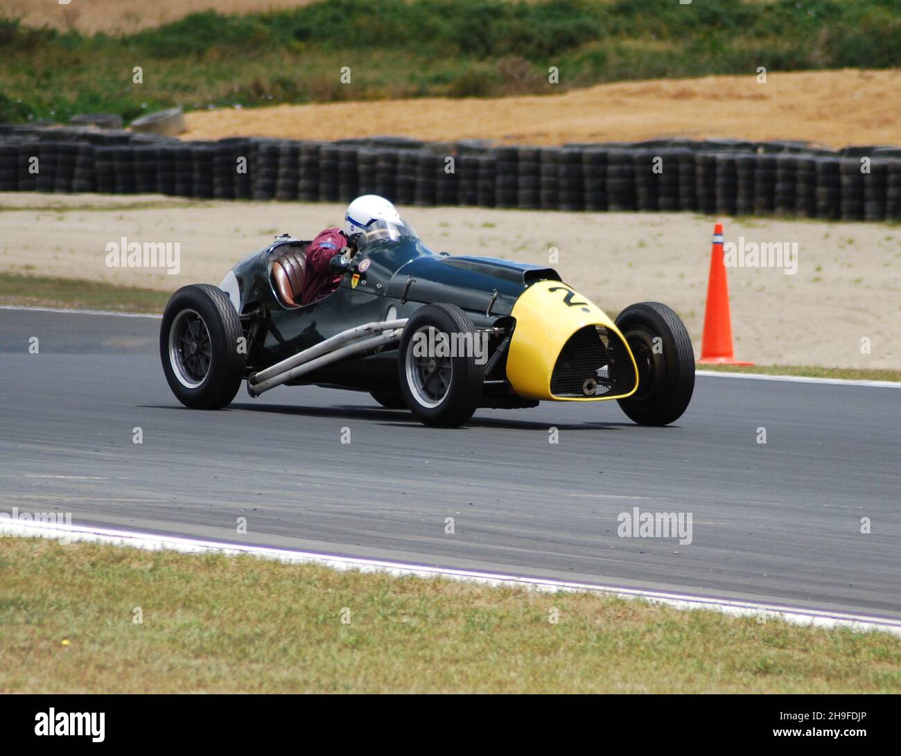 #2 David White from the UK, driving a 1953 Mk2 Cooper Bristol at the official opening of the Hampton Downs circuit. The New Zealand Festival of Motor Racing, attracted a large contingent of drivers and cars from overseas. This January 2010 Festival was to celebrate Bruce McLaren. Stock Photo