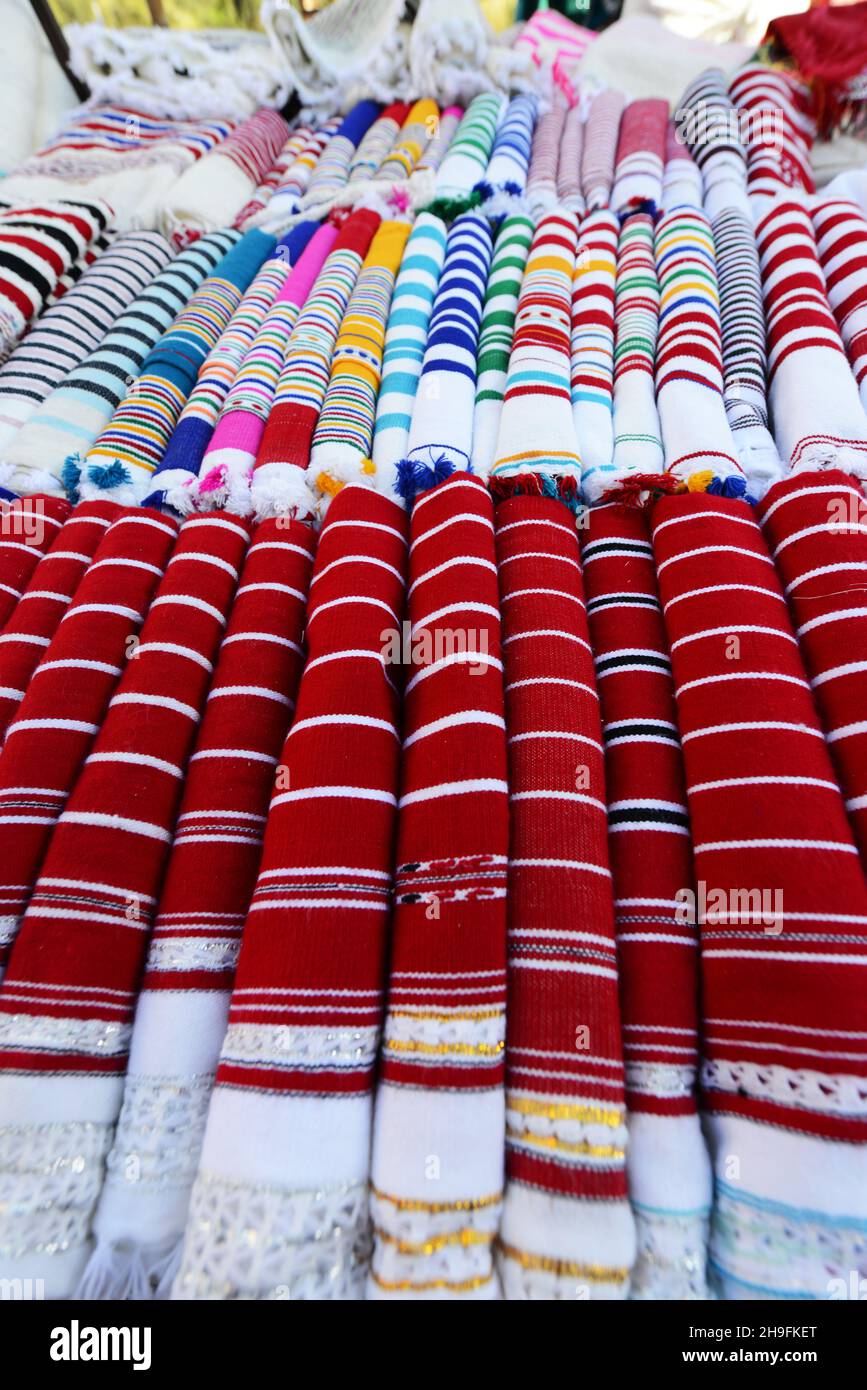 Traditional Rif mountain style of shawls and garments sold in Chefchaouen, Morocco. Stock Photo