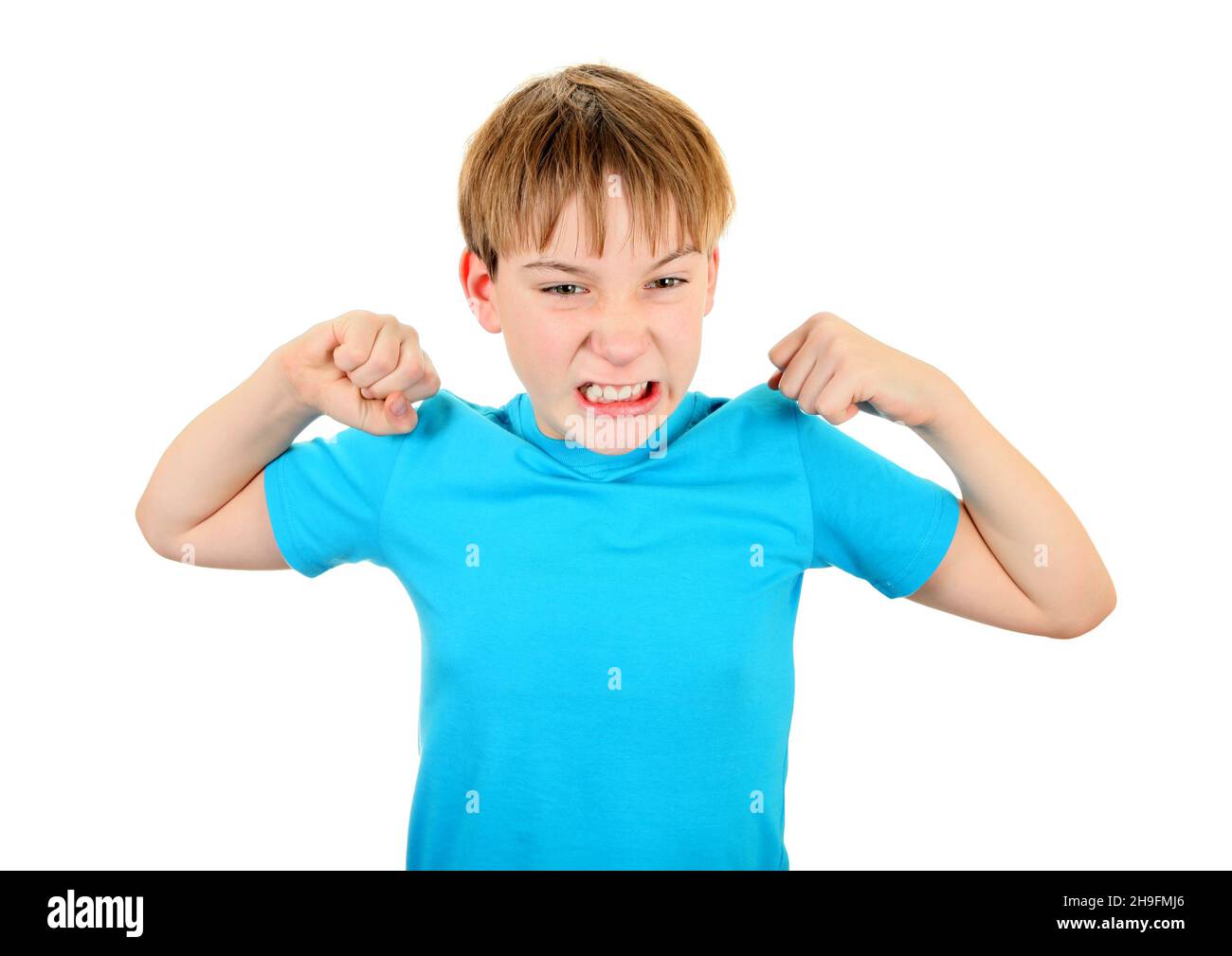 Angry Kid Muscle Flexing Isolated on the White Background Stock Photo