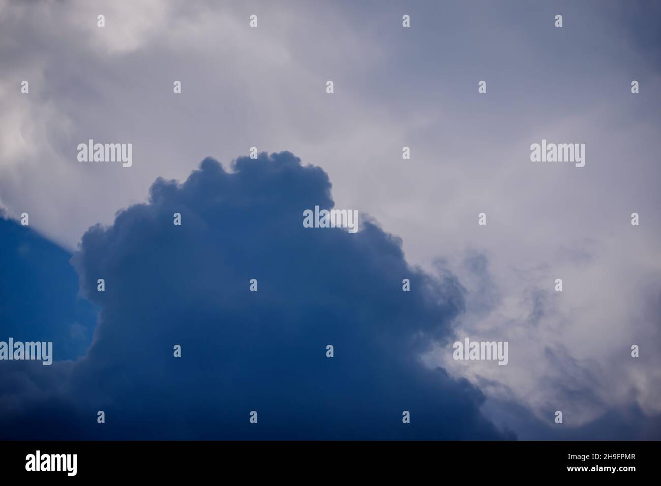 Selective focus photo. Impressive clouds before thunderstorm. Stock Photo