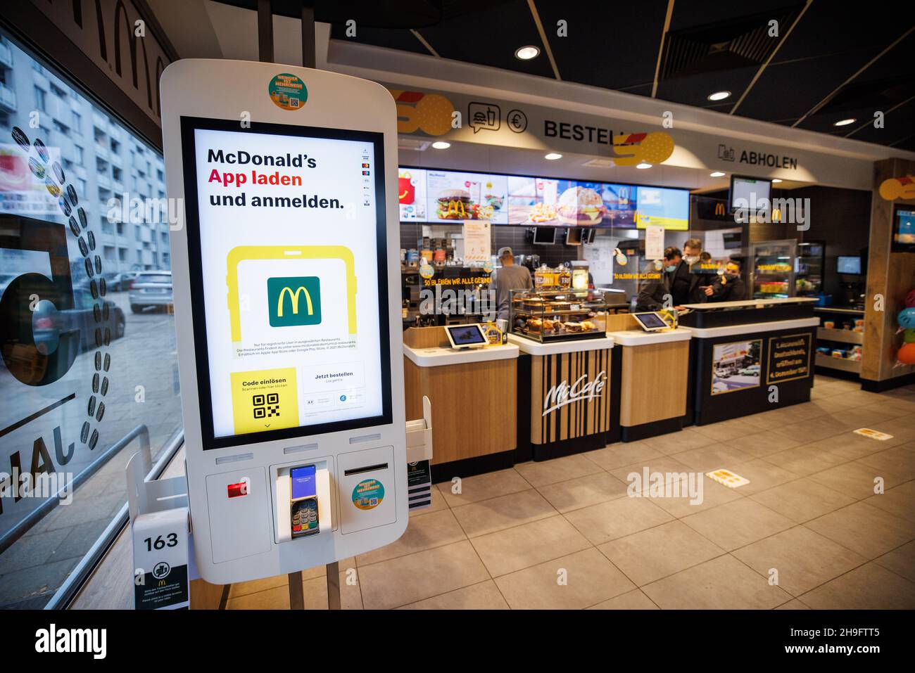 Munich, Germany. 02nd Dec, 2021. An automated ordering and payment system can be seen on a cup