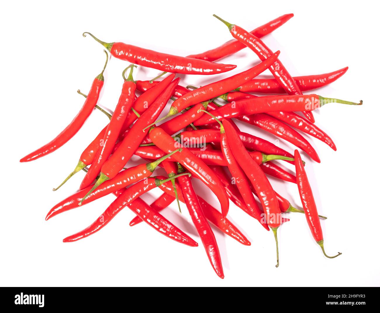 Red hot chili peppers isolated on a white background Stock Photo - Alamy