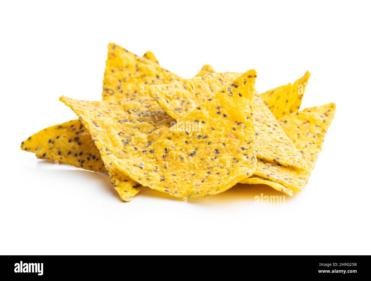 Salted tortilla chips triangle with chia seeds. Stock Photo