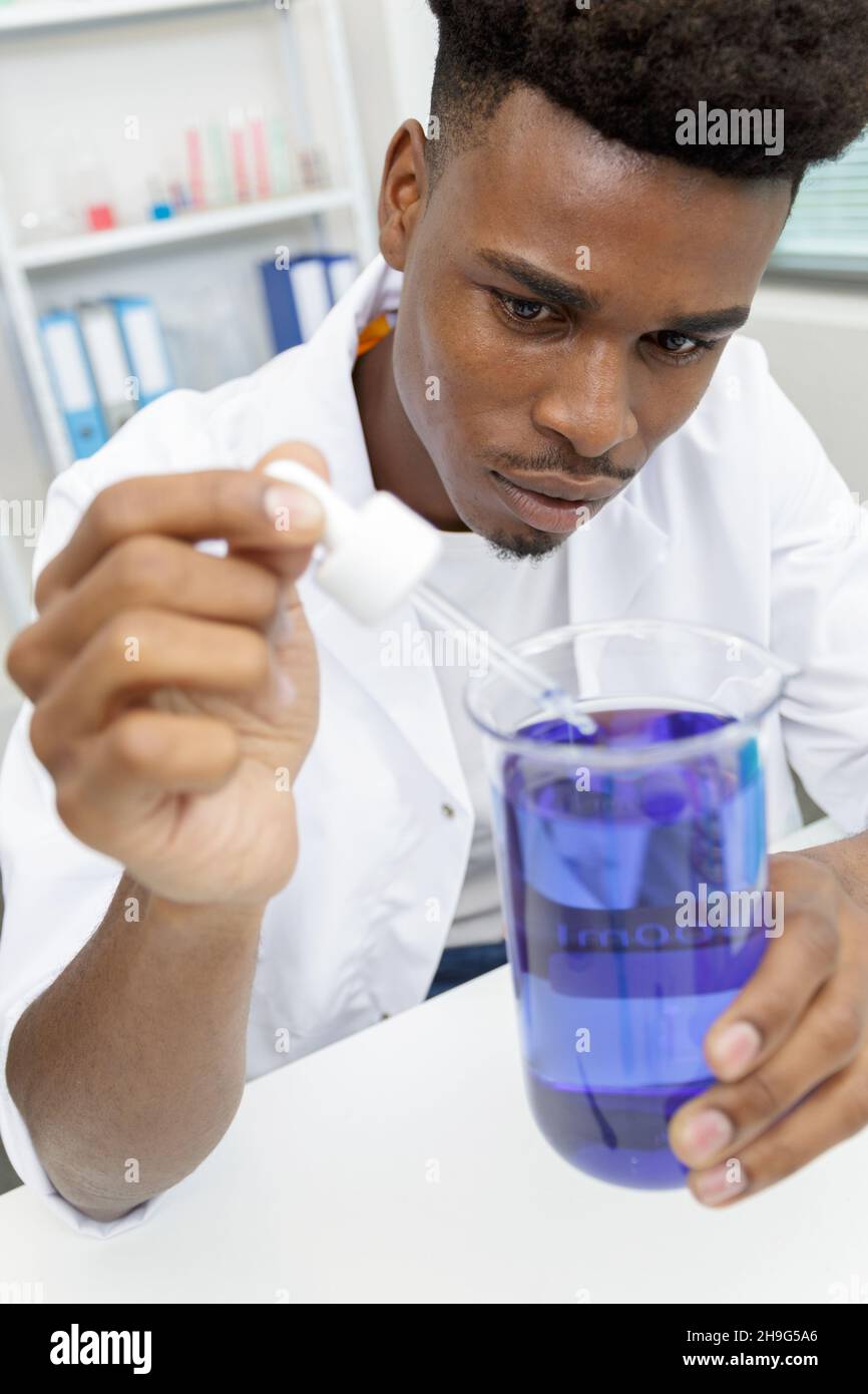 a male scientist doing experiments Stock Photo