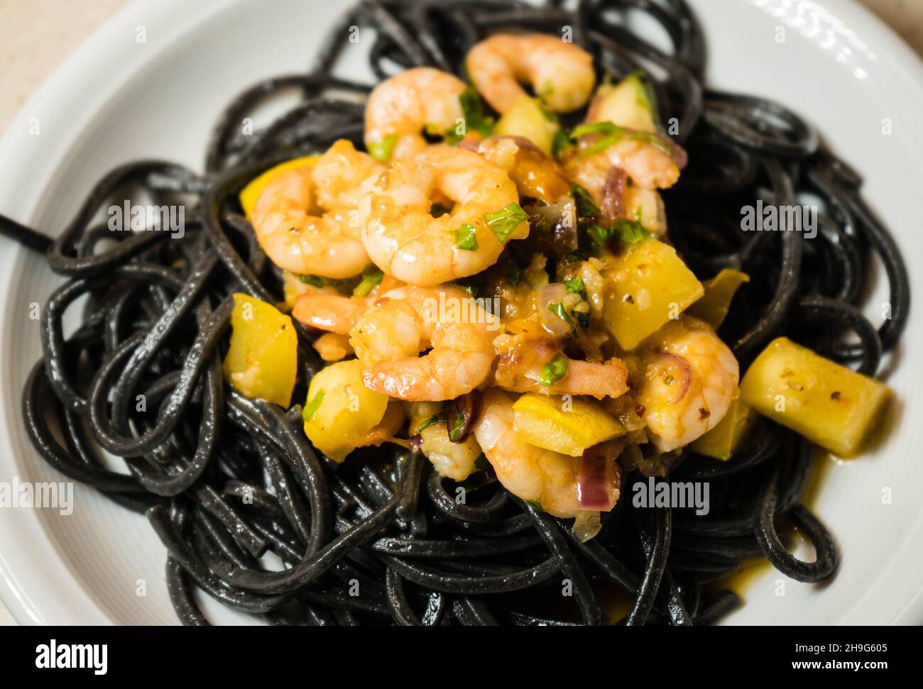Spaghetti alla busara pasta with shrimps an Italien specialty Stock