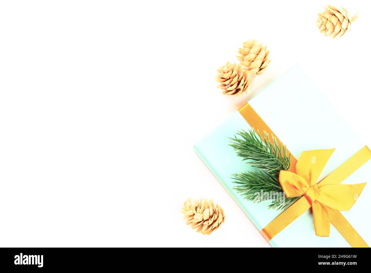 Christmas holiday composition gift box with spruce branch and cones on ...